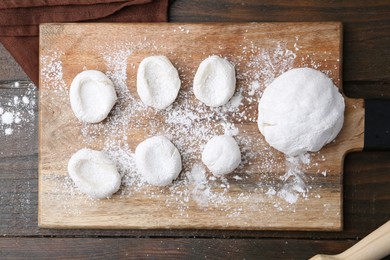 Photo of Dough for tasty homemade mochi on wooden table, top view