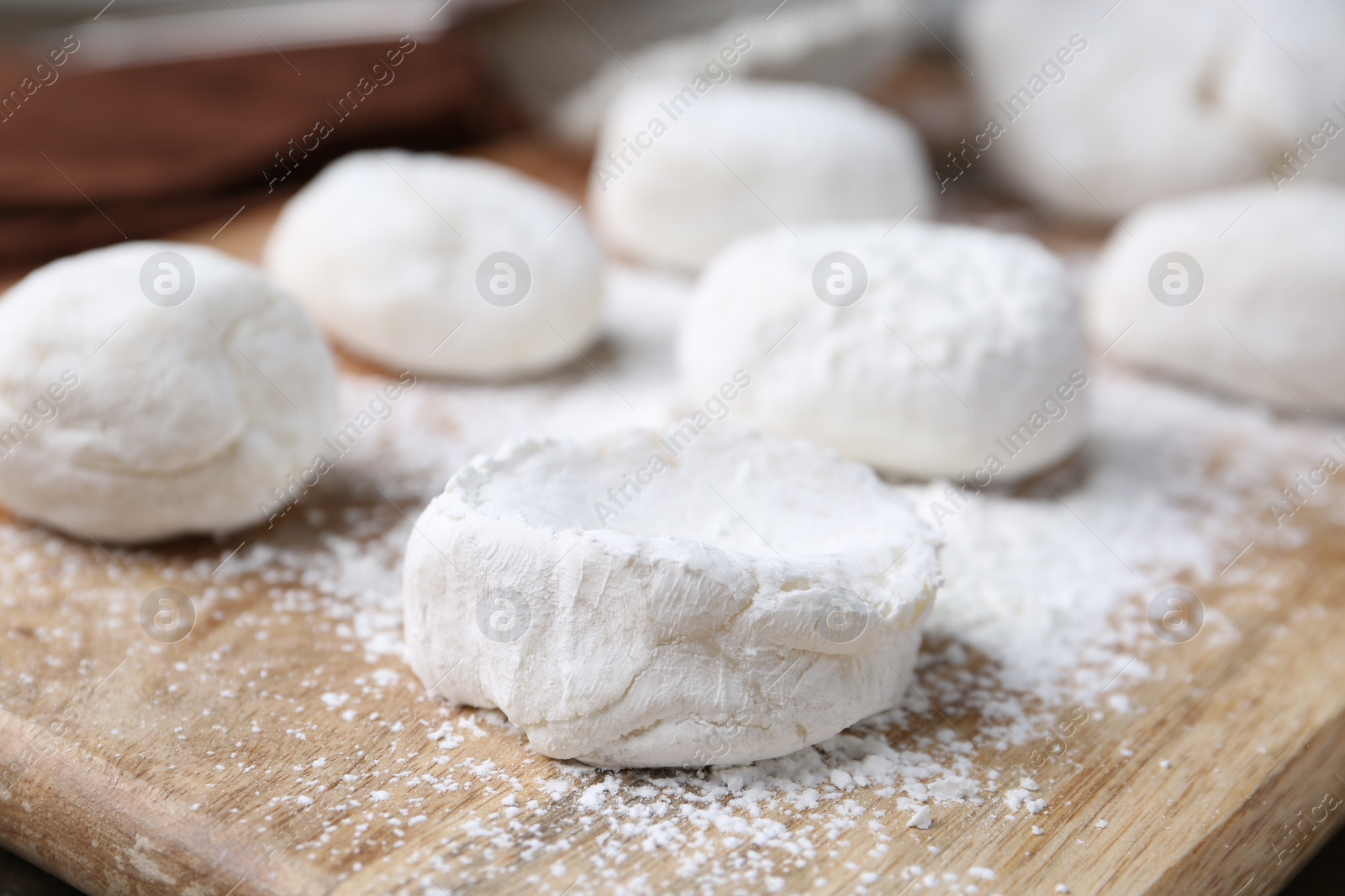 Photo of Dough for tasty homemade mochi on wooden table, closeup