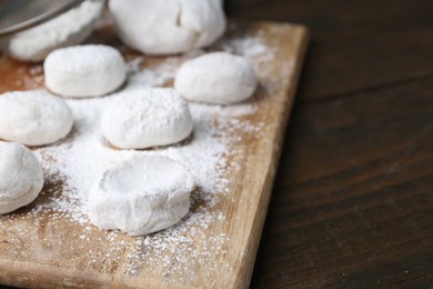 Photo of Dough for tasty homemade mochi on wooden table, closeup. Space for text