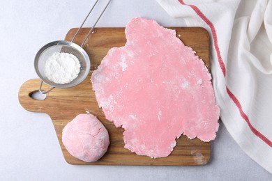 Photo of Dough for tasty homemade mochi on white table, top view