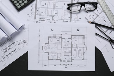 Different architectural drawings, ruler, divider and pencil on grey textured table, flat lay