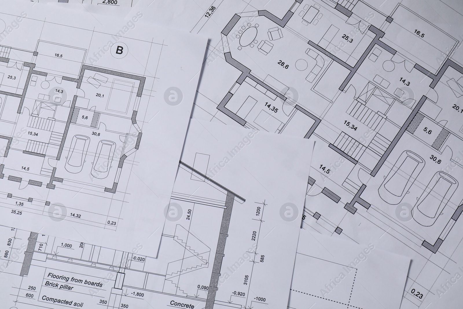 Photo of Different architectural drawings on table, flat lay