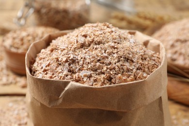 Paper bag with wheat bran, closeup view