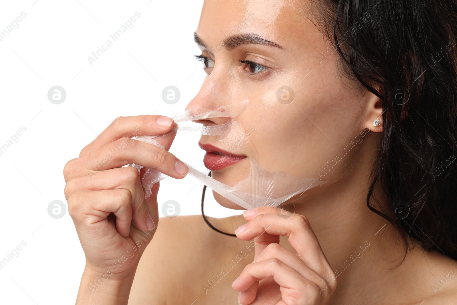 Photo of Beautiful woman peeling off face mask on white background