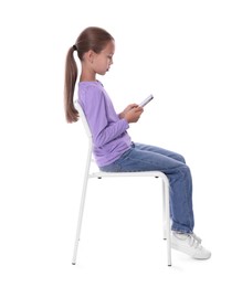 Photo of Girl with correct posture and smartphone sitting on white background