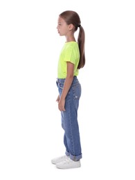 Girl with correct posture standing on white background