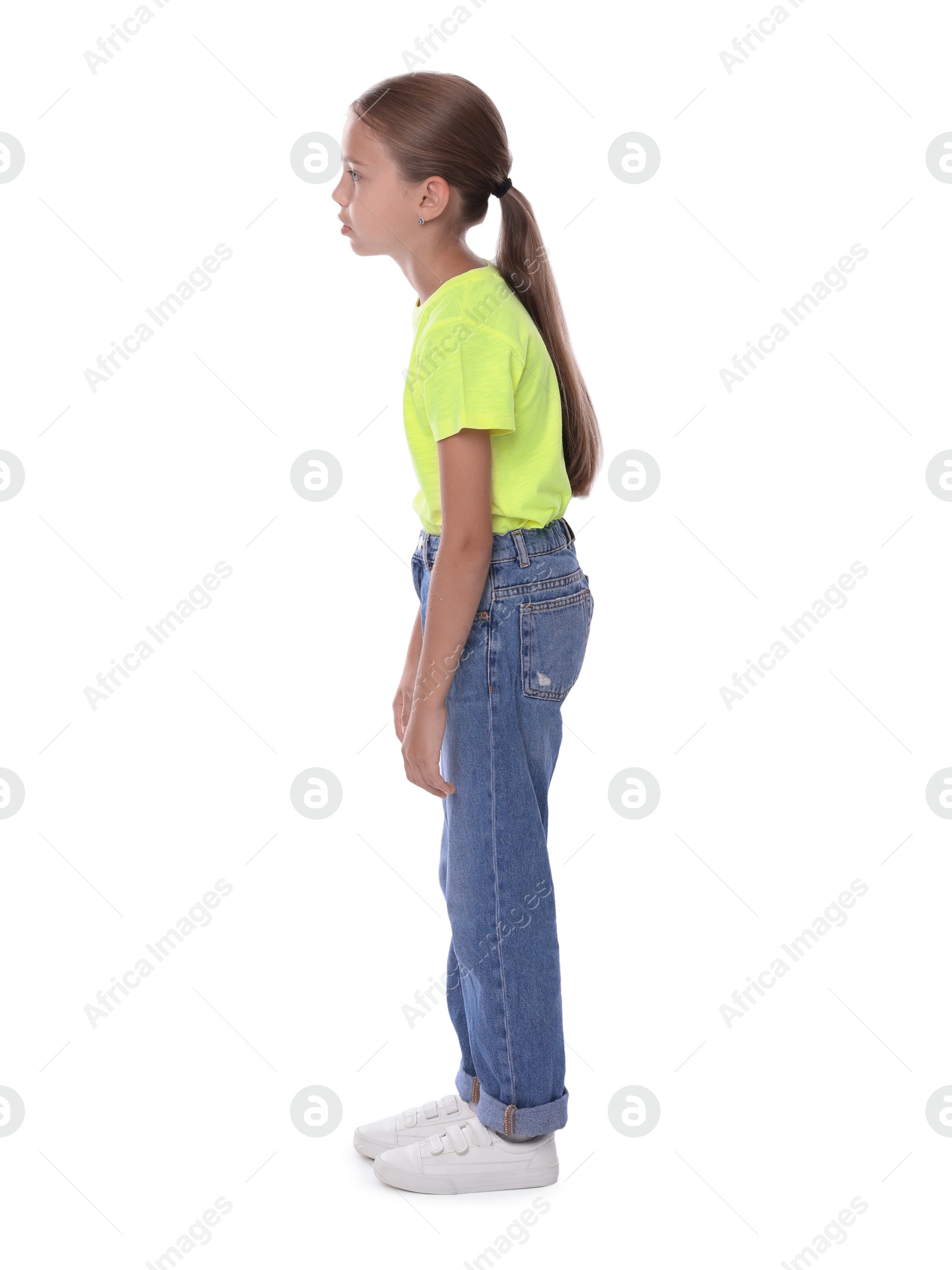 Photo of Girl with incorrect posture standing on white background