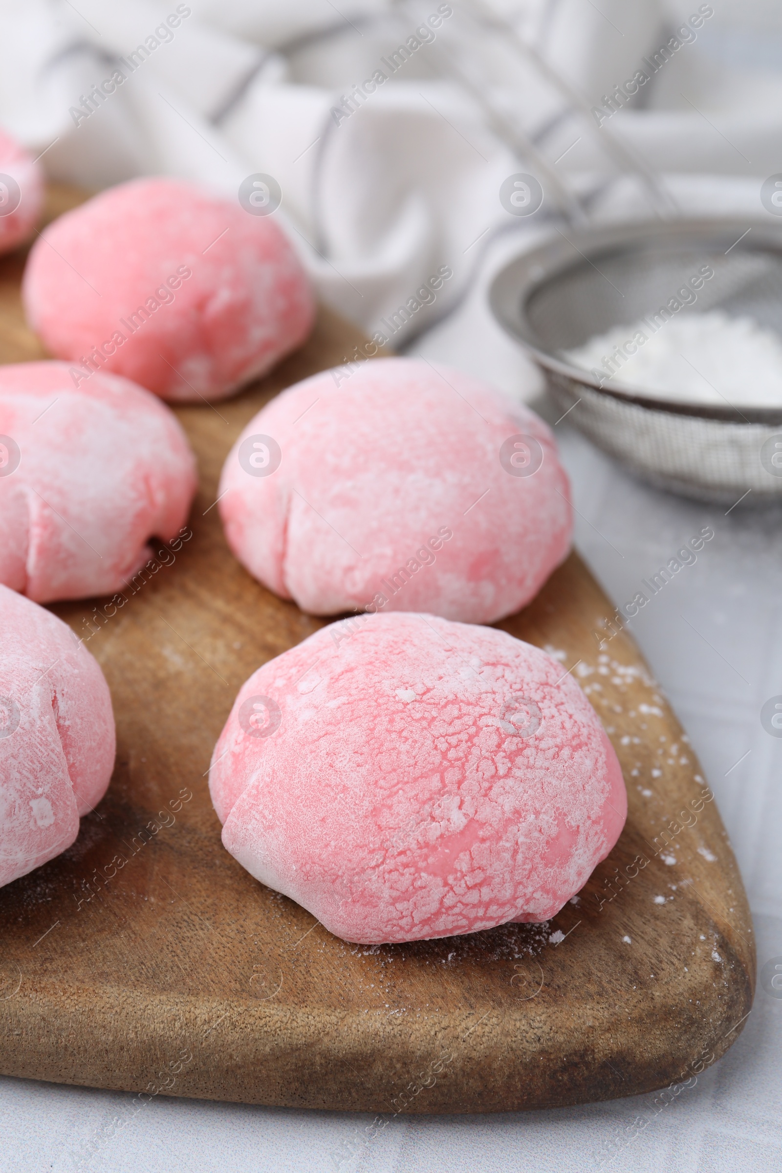 Photo of Tasty homemade mochi on white table, closeup