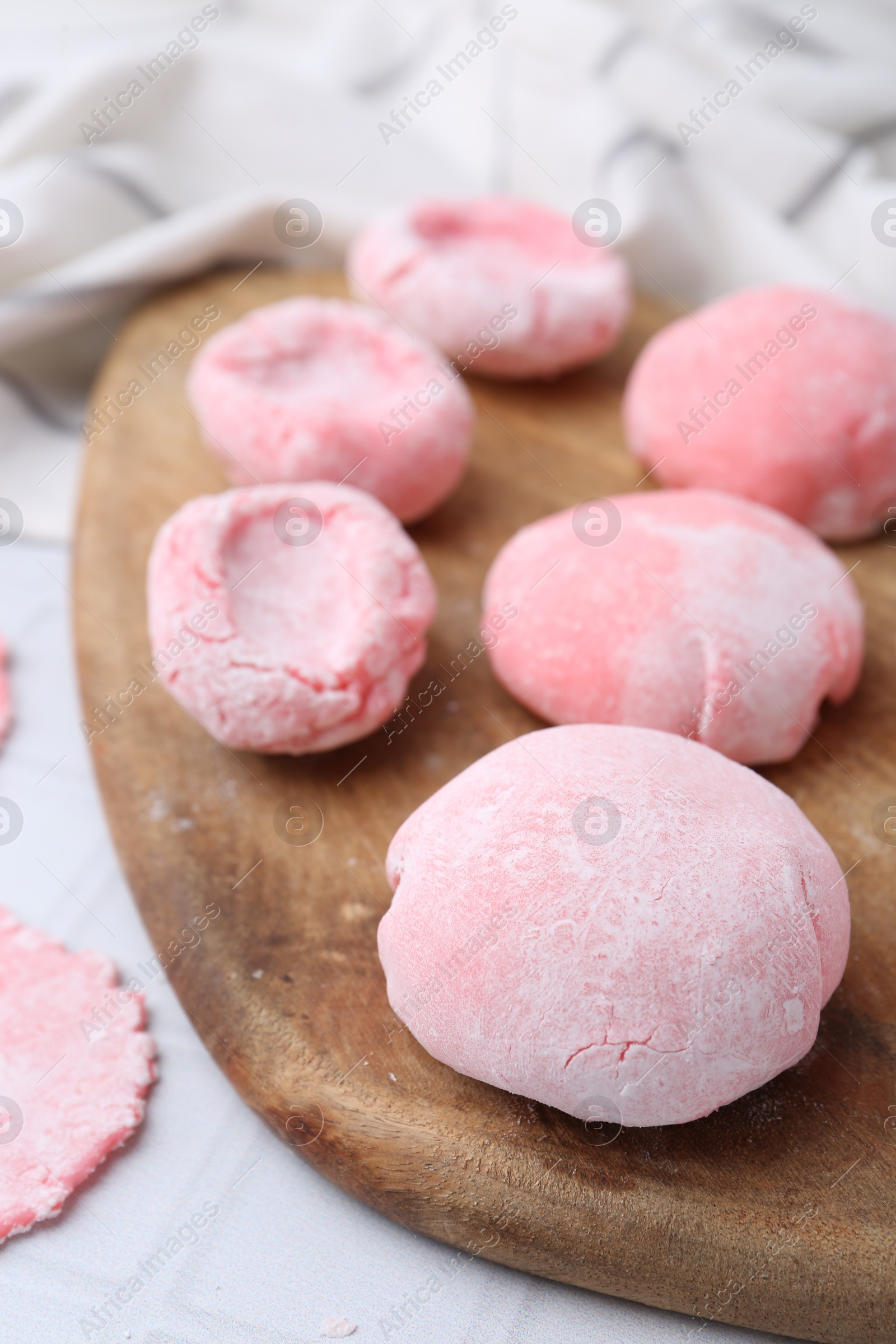 Photo of Tasty homemade mochi on white table, closeup