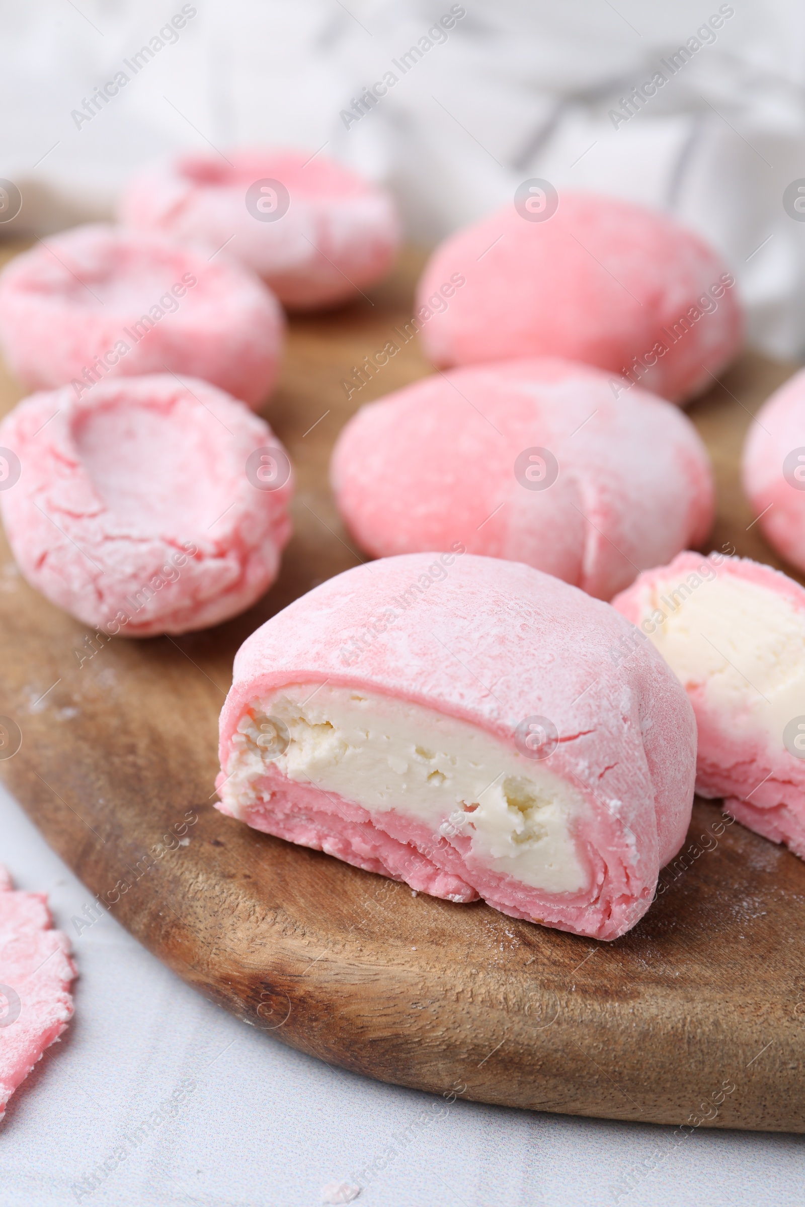 Photo of Tasty homemade mochi on white table, closeup