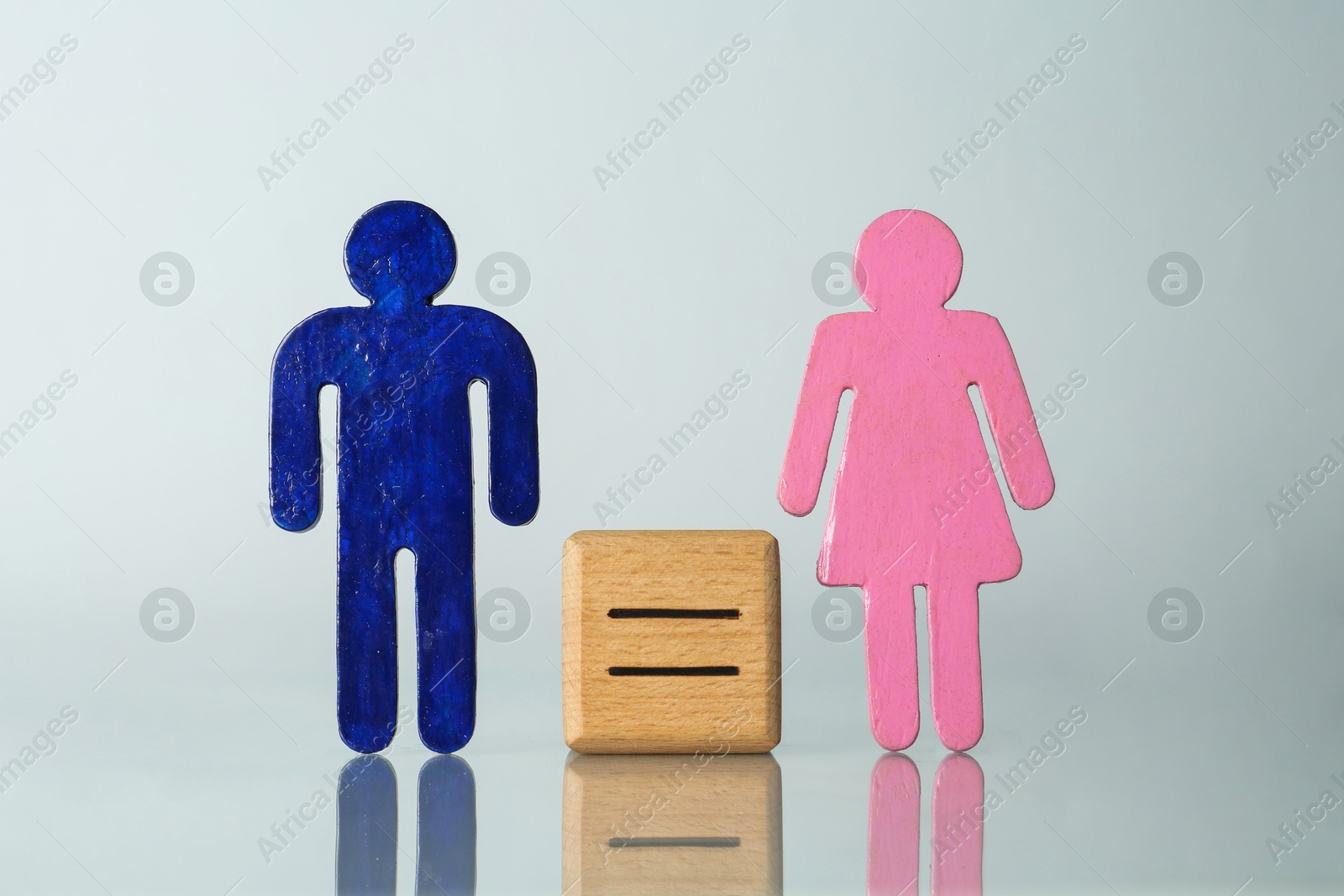 Photo of Gender equality concept. Male and female figures on light background