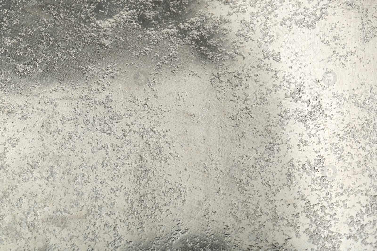 Photo of Shiny silver surface as background, closeup view