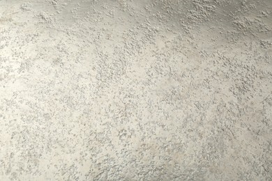 Photo of Shiny silver surface as background, closeup view