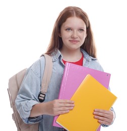 Photo of Teenage girl with backpack and books on white background