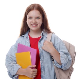 Photo of Teenage girl with backpack and books on white background