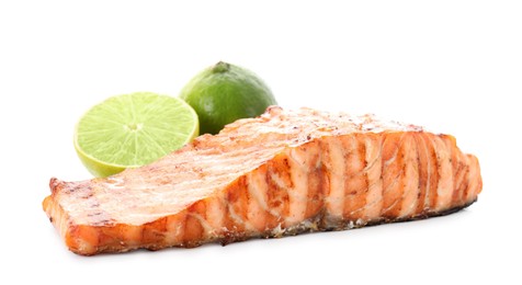 Photo of Delicious grilled salmon fillet with lime isolated on white