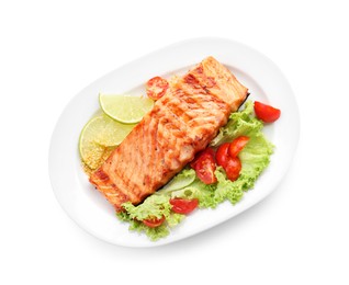 Photo of Delicious grilled salmon fillet with vegetable salad and lime isolated on white, top view