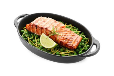 Photo of Delicious grilled salmon fillet with lime and green peas in baking dish isolated on white