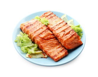 Photo of Delicious grilled salmon fillets with lettuce and lemon isolated on white