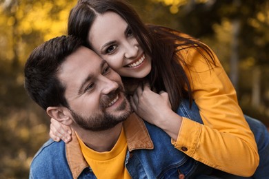 Photo of Portrait of beautiful couple in park on autumn day