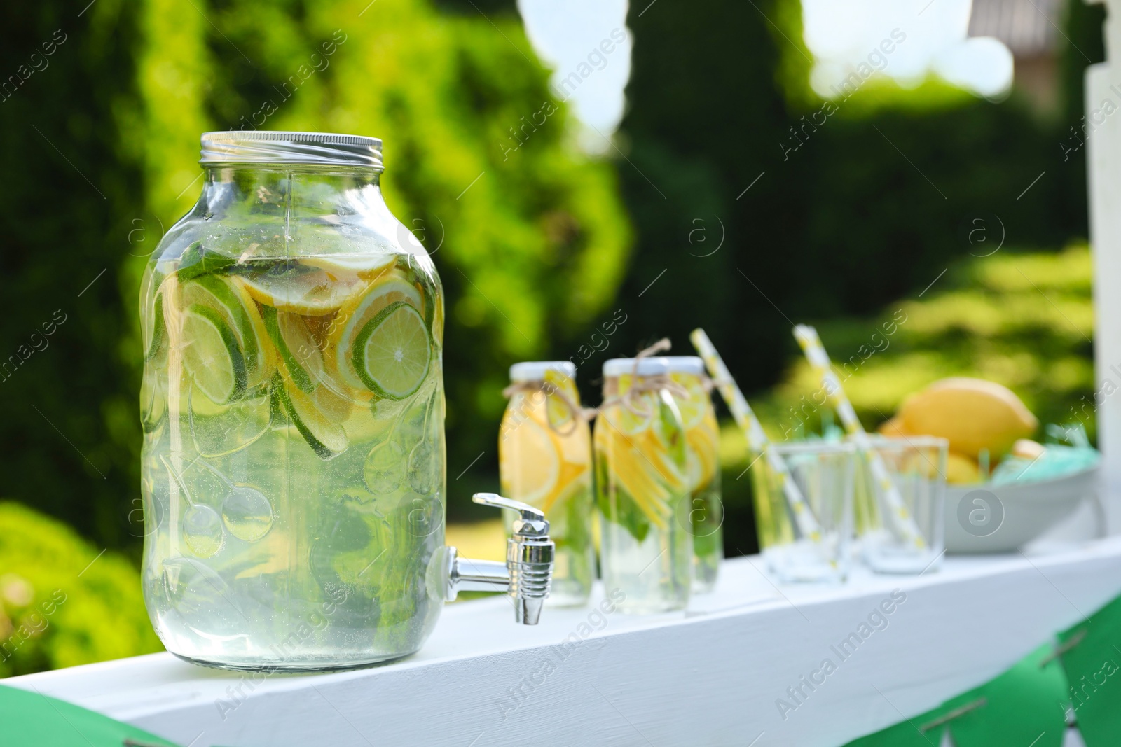 Photo of Lemonade stand with refreshing drink in park