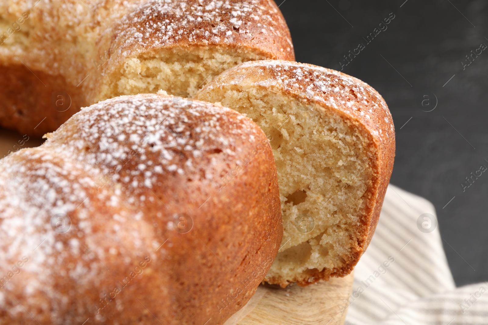 Photo of Freshly baked sponge cake on table, closeup