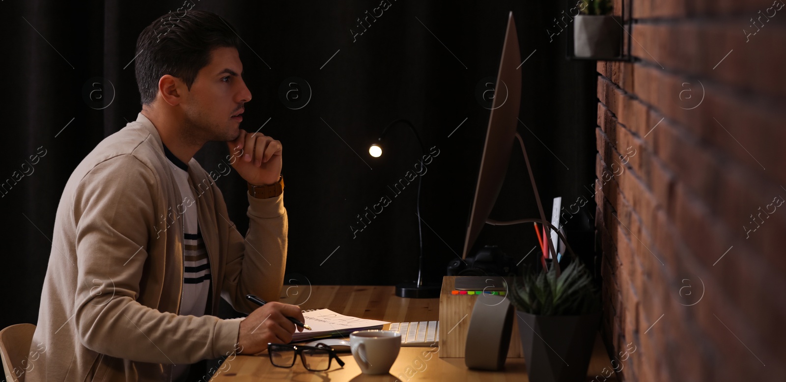 Image of Programmer working with modern computer in office. Banner design