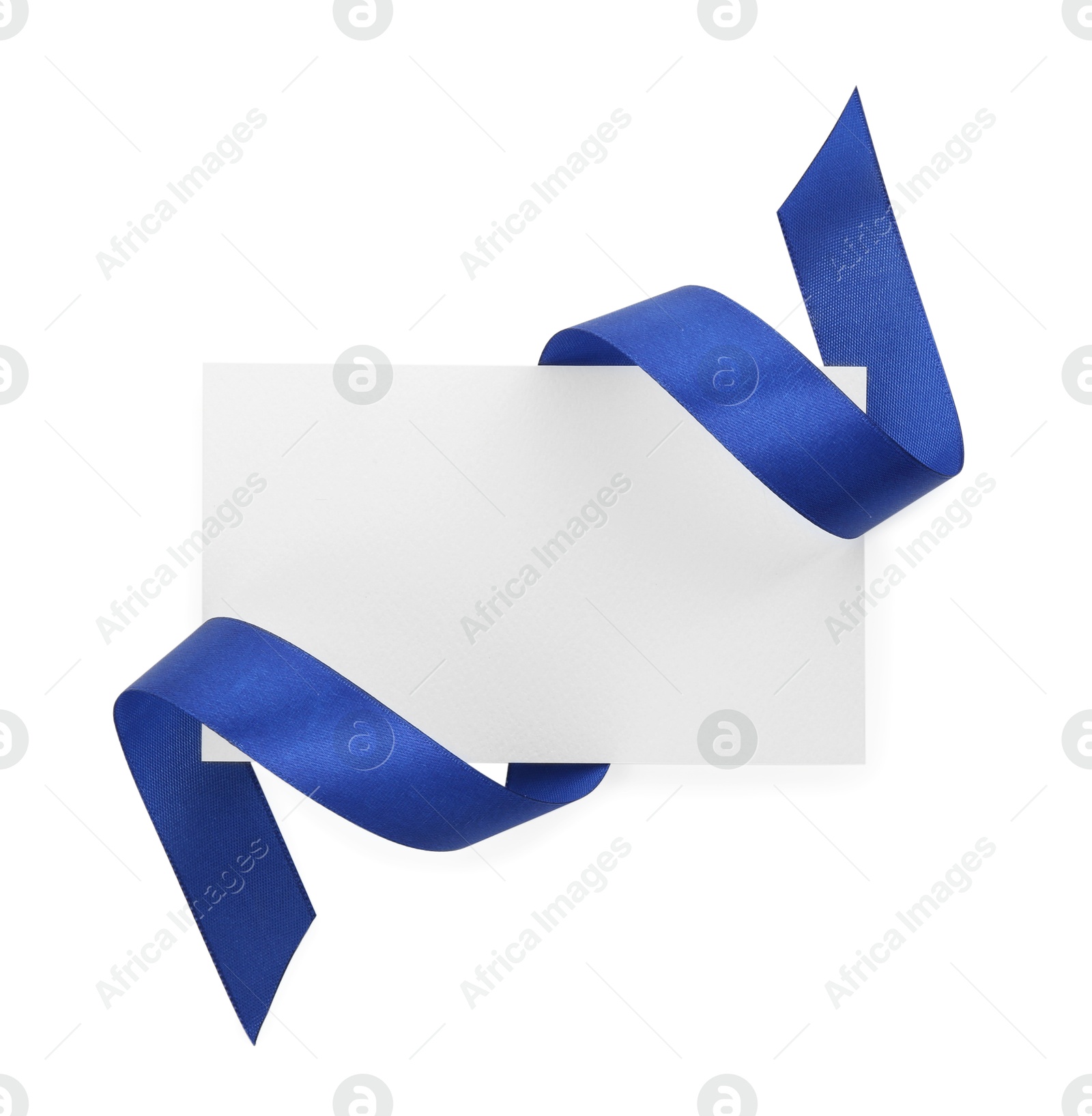 Photo of Blank card and blue ribbon isolated on white, top view