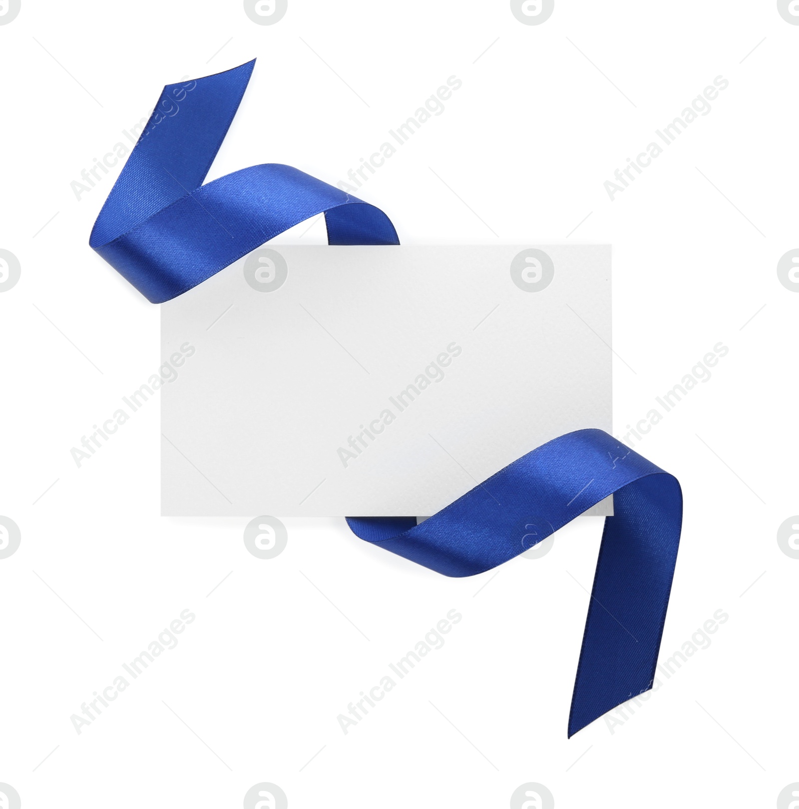 Photo of Blank card and blue ribbon isolated on white, top view