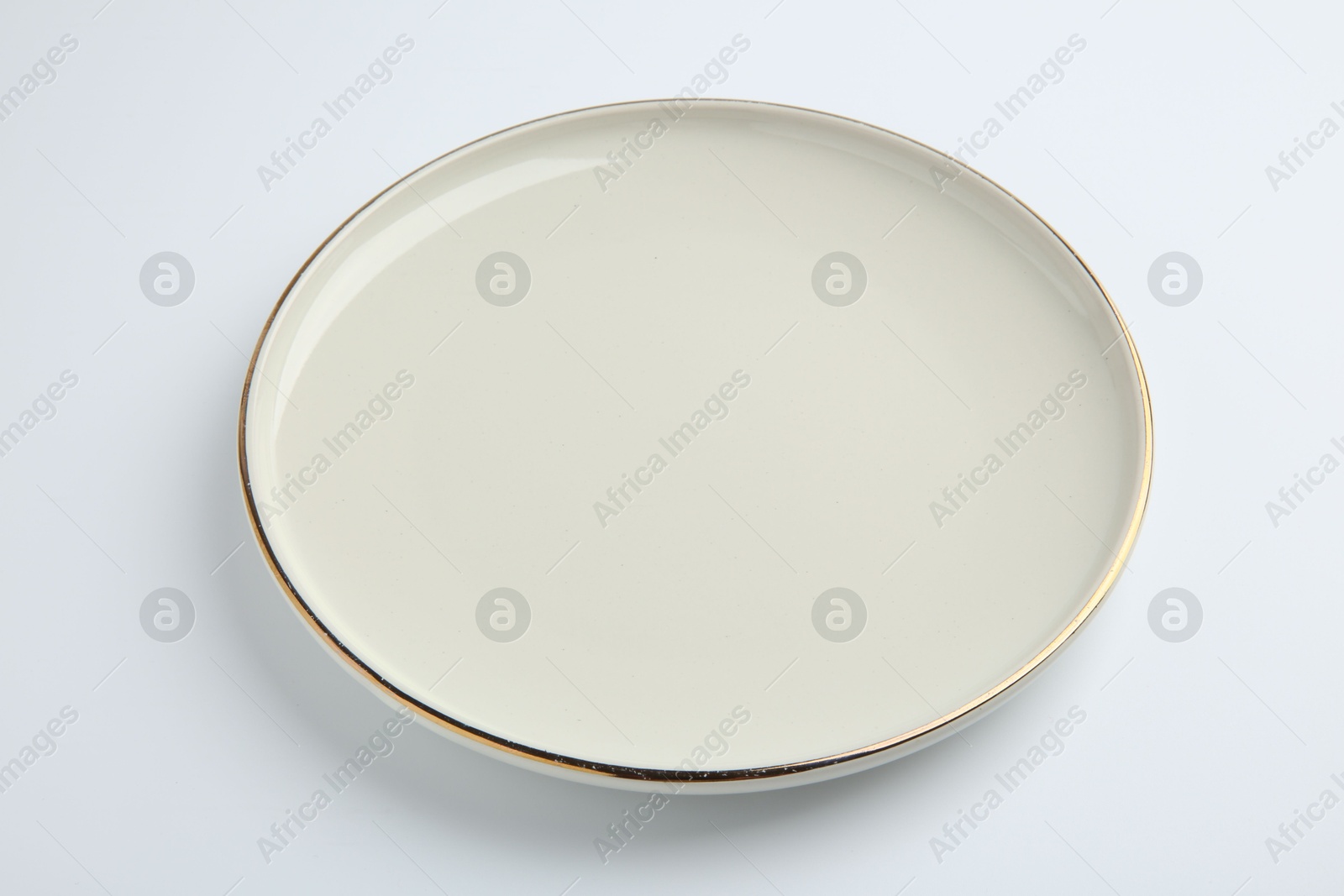 Photo of One empty ceramic plate isolated on white