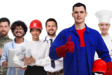 Technician and people of other professions on white background, selective focus