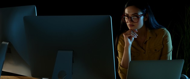 Programmer working in office at night. Banner design