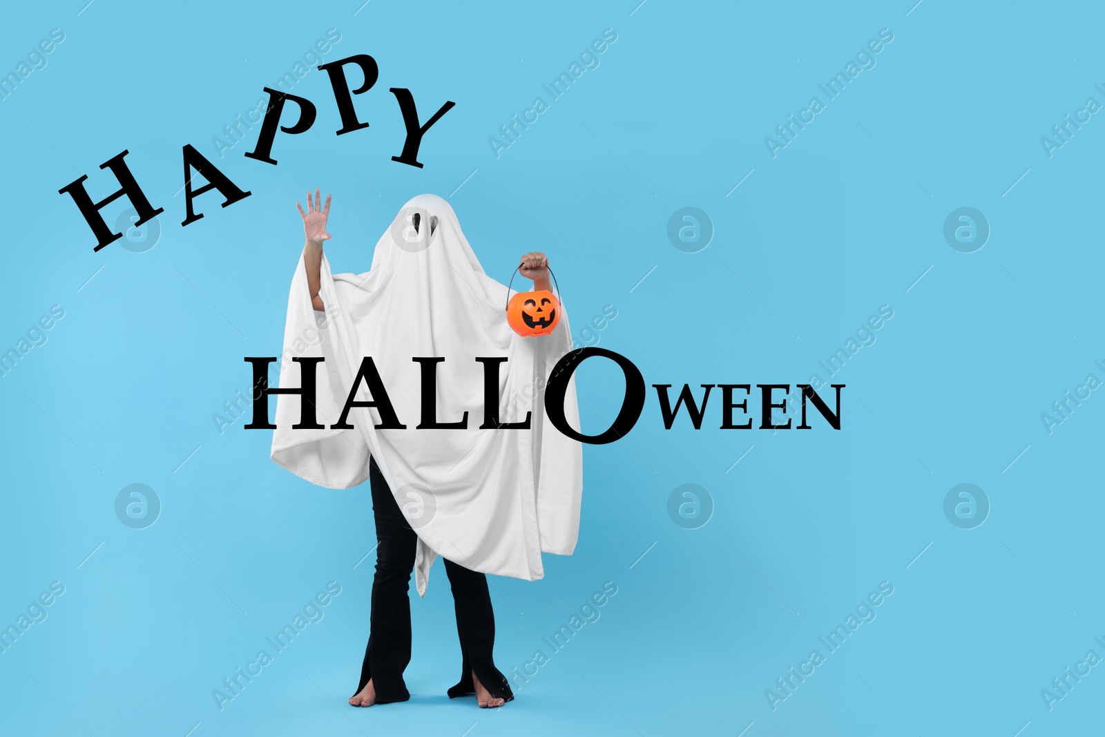 Image of Happy Halloween card with woman in ghost costume on light blue background