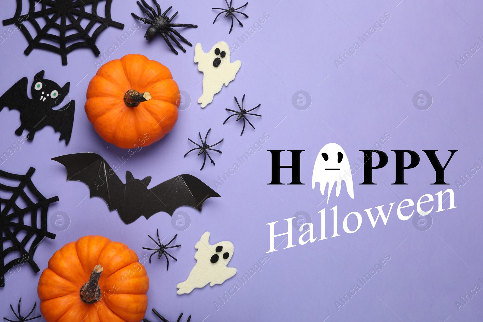 Image of Happy Halloween text and spooky decor on violet background, top view. Greeting card