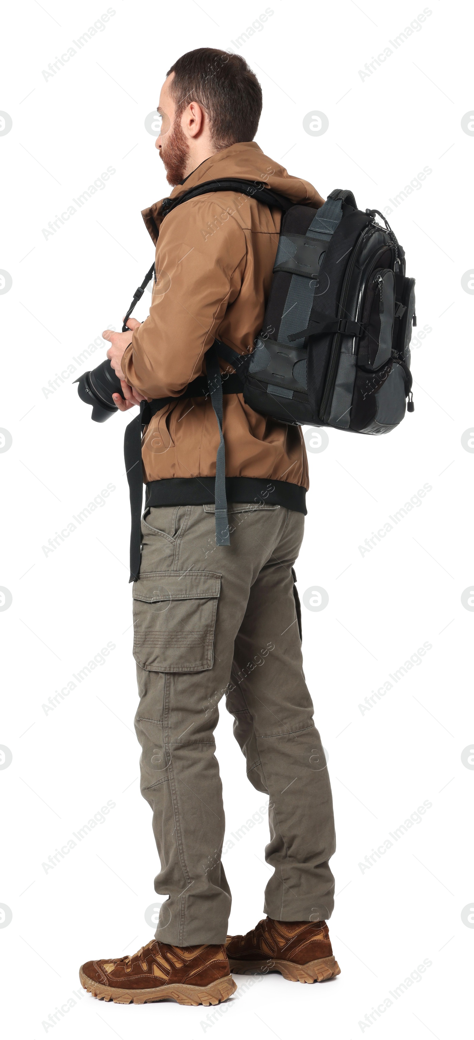 Photo of Photographer with backpack and camera on white background, back view