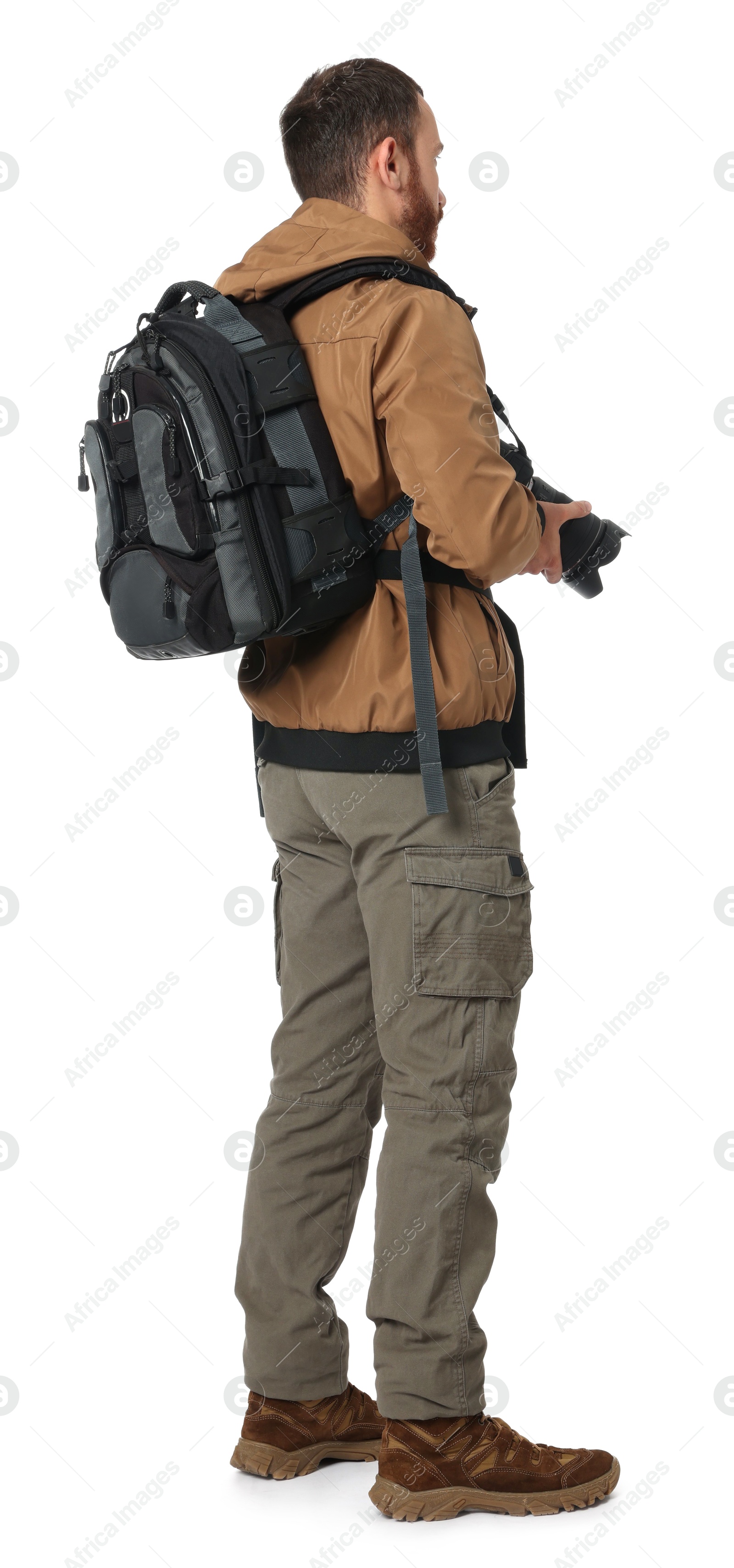 Photo of Photographer with backpack and camera on white background, back view