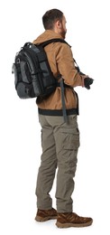 Photo of Photographer with backpack and camera on white background, back view