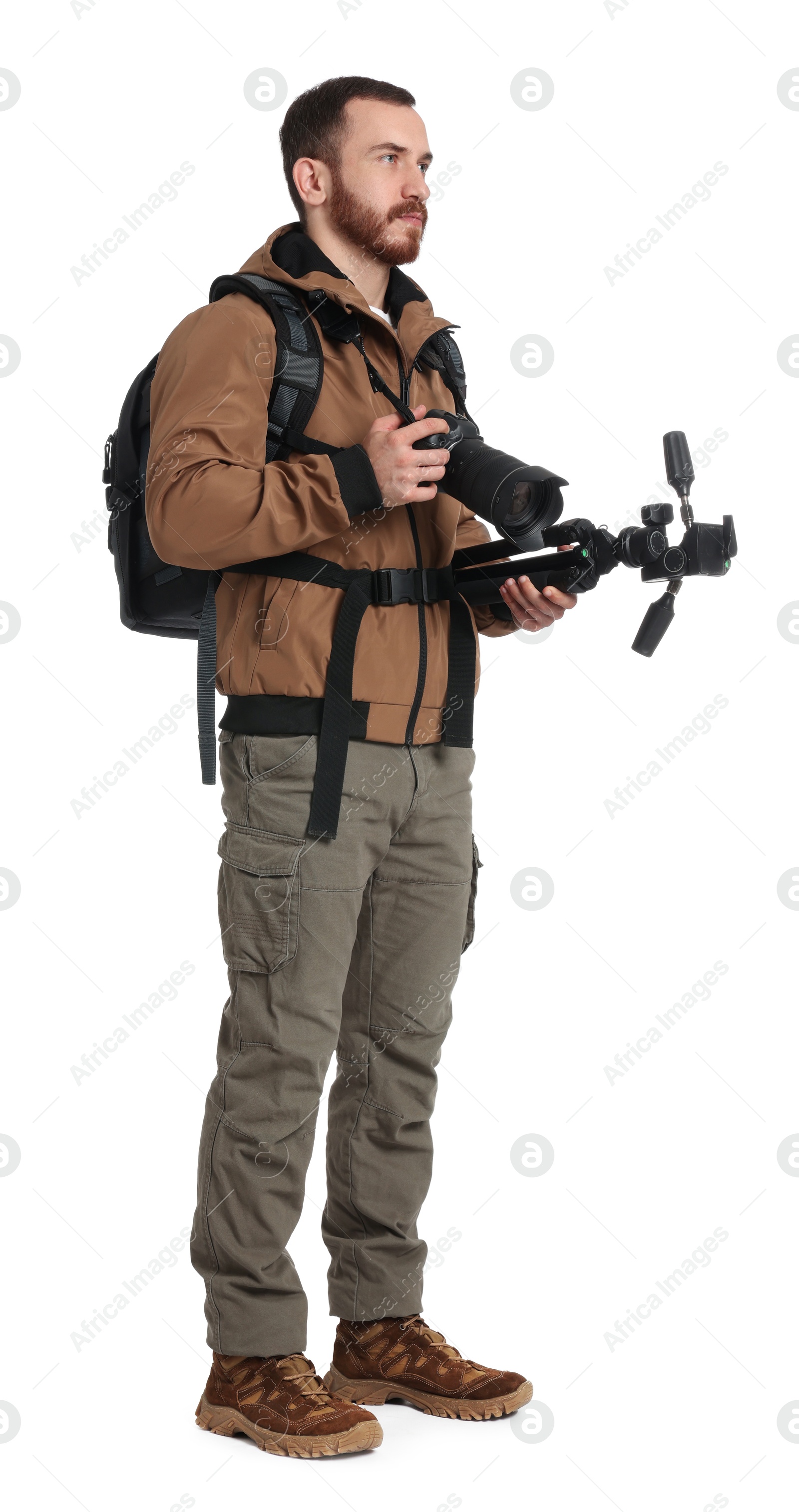 Photo of Photographer with backpack and camera on white background