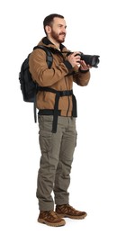 Photographer with backpack and camera on white background