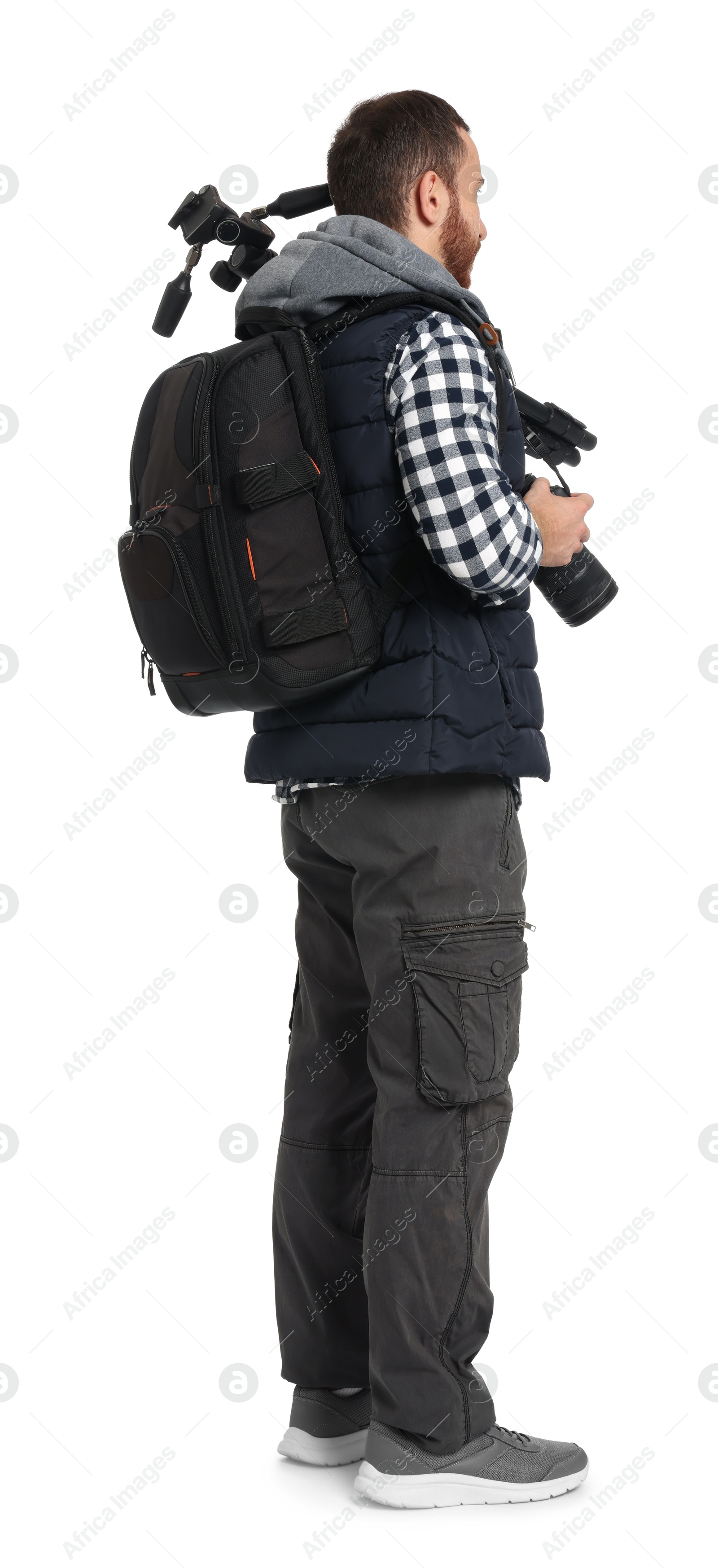 Photo of Photographer with backpack and camera on white background, back view