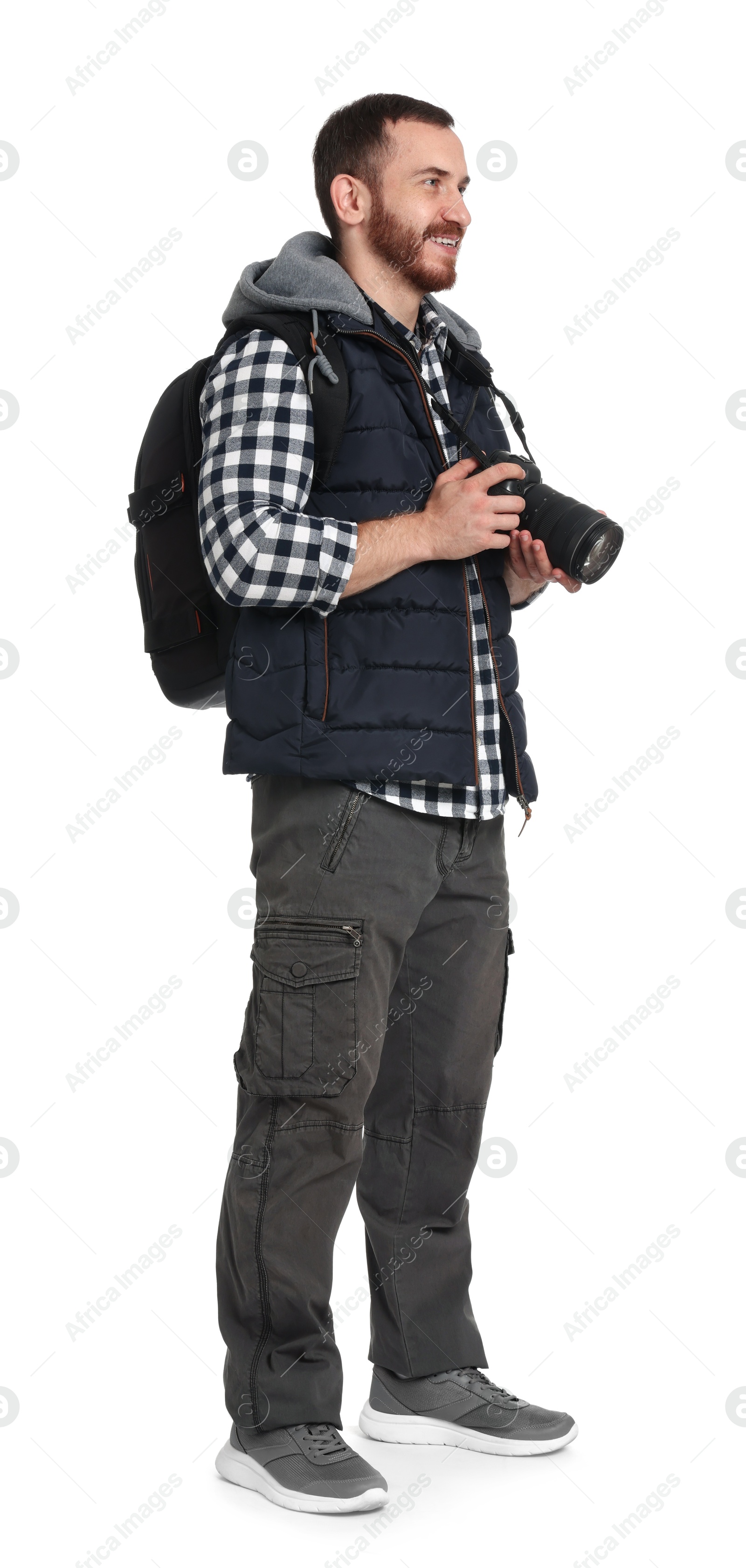 Photo of Photographer with backpack and camera on white background