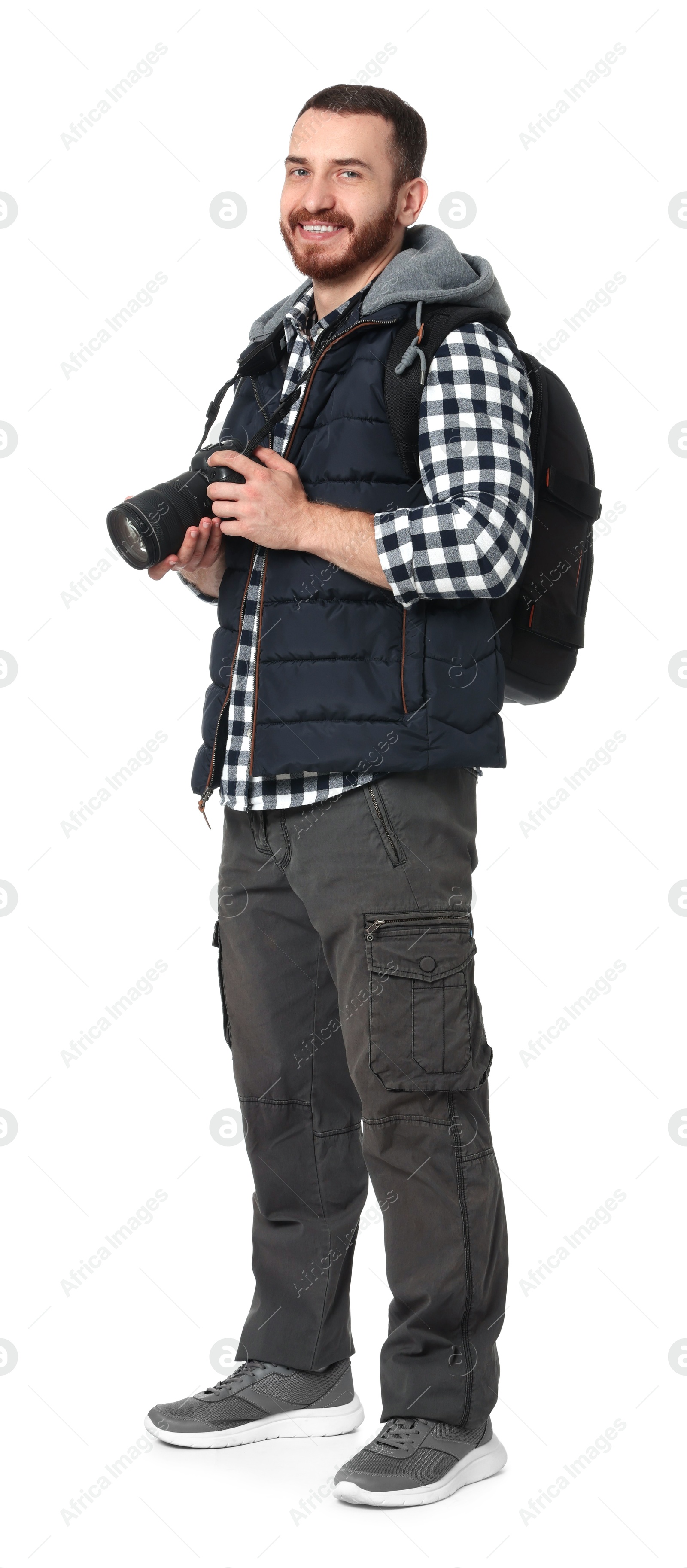 Photo of Photographer with backpack and camera on white background