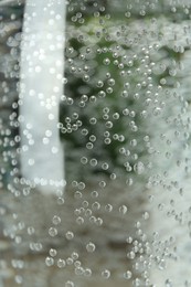 Photo of Fresh soda water in glass, closeup view