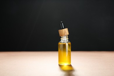 Photo of Natural tincture in bottle on color background