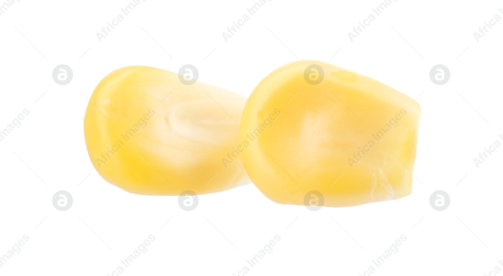 Photo of Fresh ripe corn kernels isolated on white