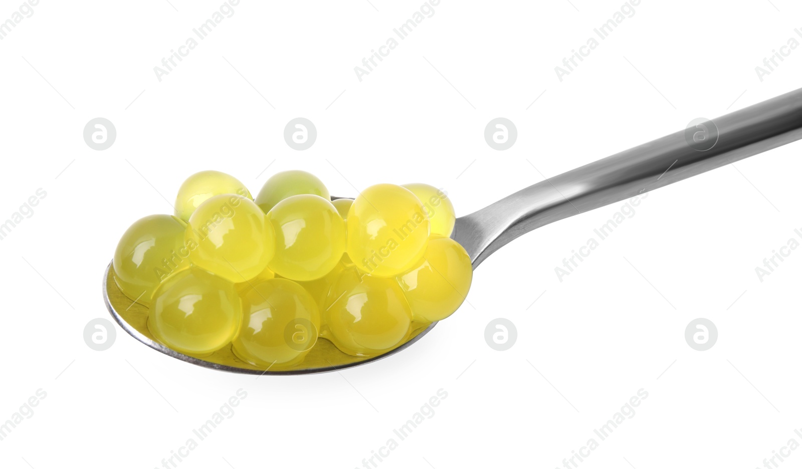 Photo of Bright tapioca pearls in spoon isolated on white