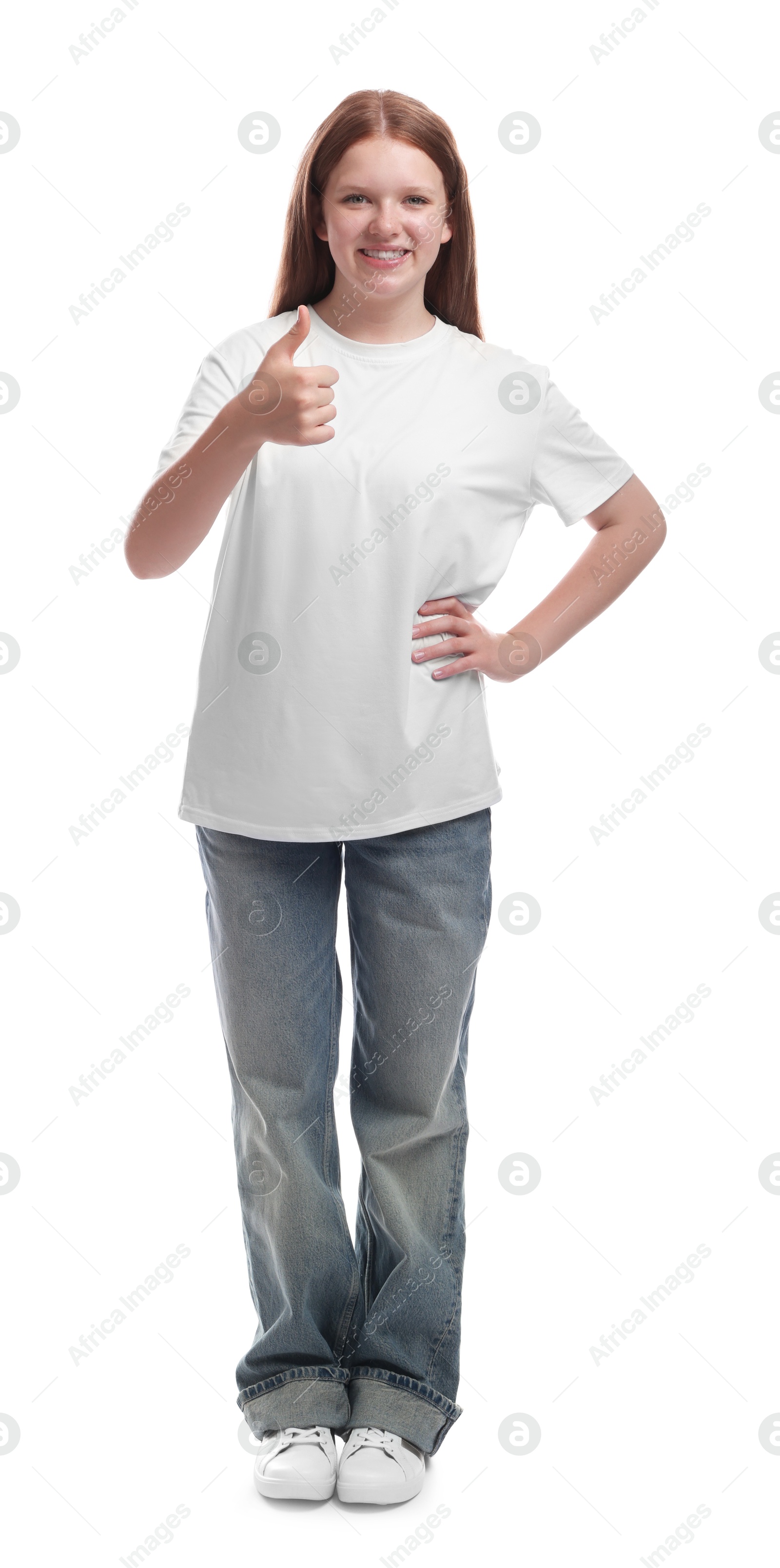 Photo of Teenage girl showing thumbs up on white background