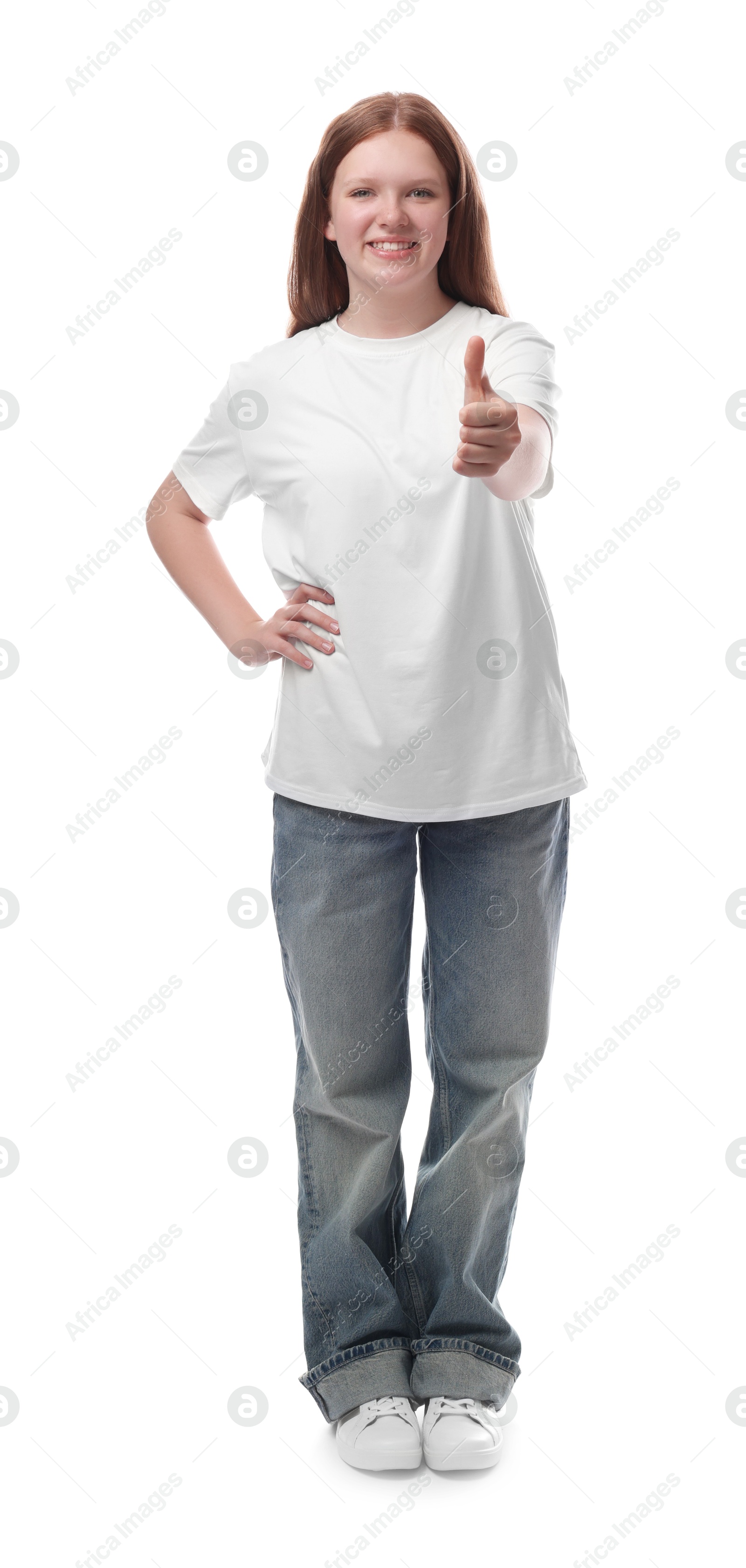 Photo of Teenage girl showing thumbs up on white background