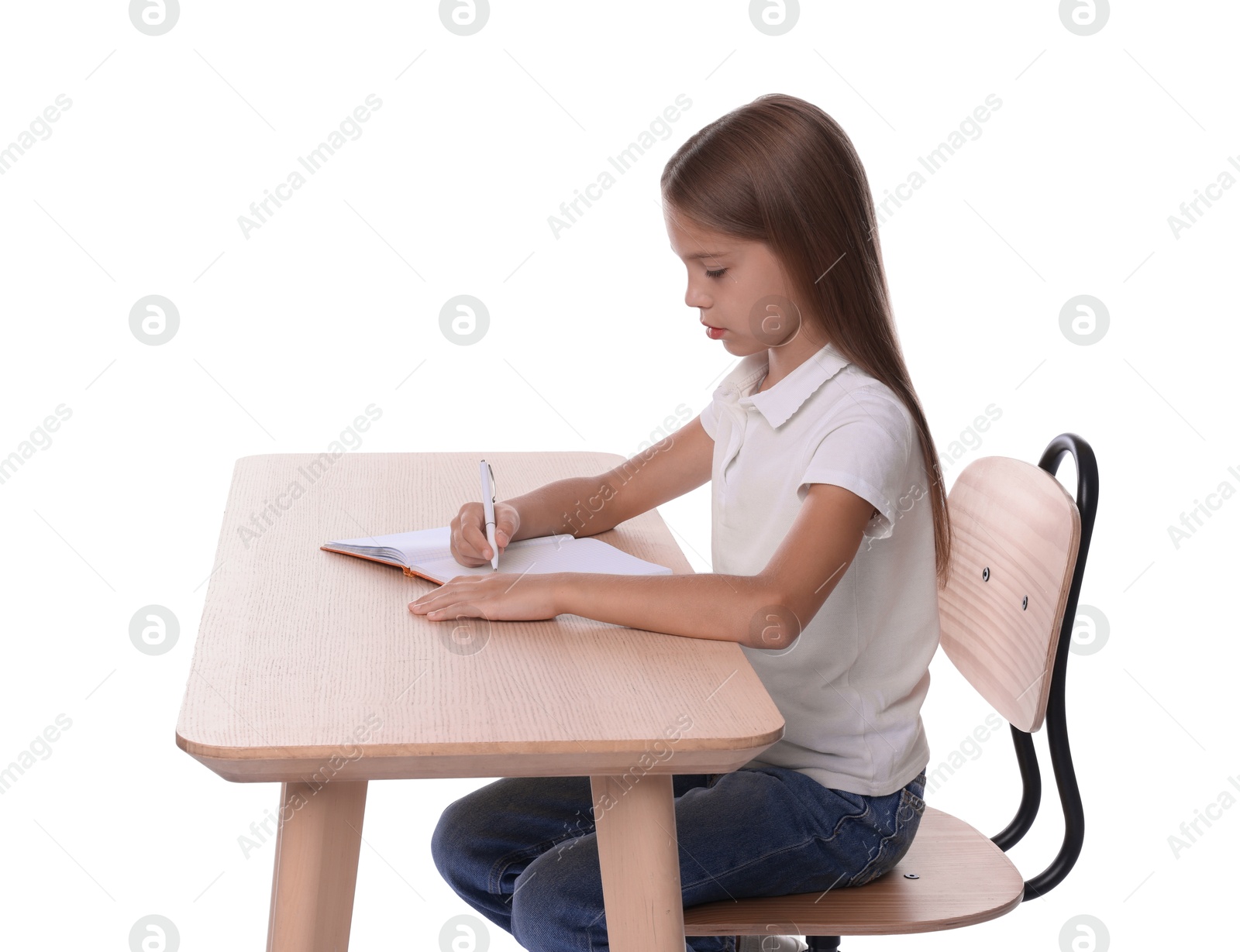 Photo of Girl with correct posture and notebook sitting at wooden desk on white background