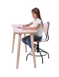 Photo of Girl with correct posture and notebook sitting at wooden desk on white background